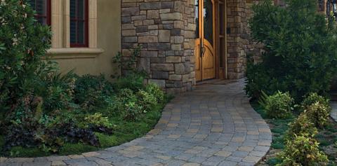 Traditional Walkway with stained wood front door