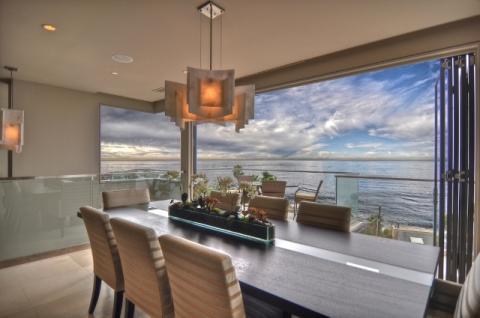 Modern Dining Room with striped upholstered dining chairs