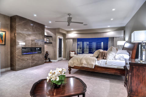 Transitional Bedroom with custom gray valance with floor to ceiling draperies