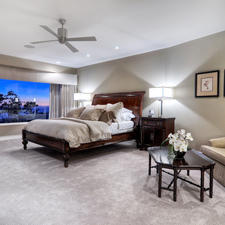 Transitional Bedroom with custom gray valance with floor to ceiling drapery
