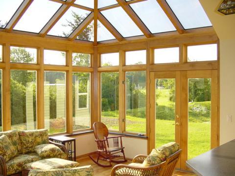 Traditional Sunroom with beautiful skylights