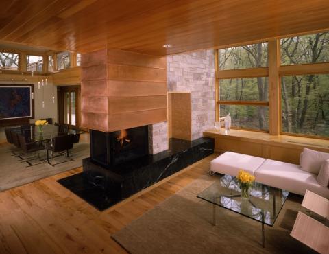 Contemporary Family Room with leather chairs around dining table
