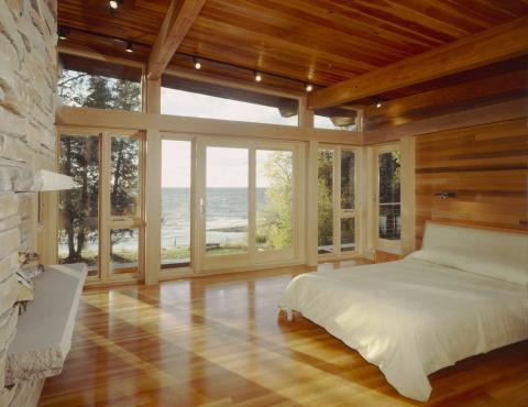 Contemporary Bedroom with white framed windows and doors