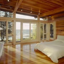 Contemporary Bedroom with white framed windows and doors