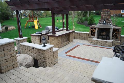 Traditional Patio with grass landscape around patio