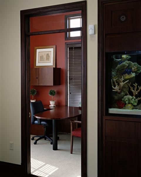 Contemporary Home Office with beige carpeted flooring