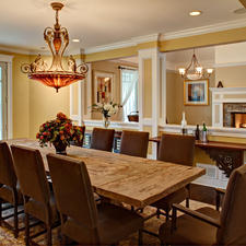 Traditional Dining Room with leather upholstered chairs
