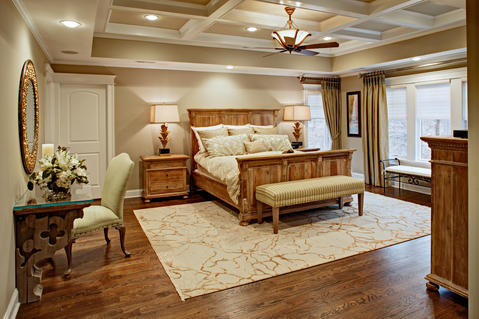 Transitional Bedroom with off white throw pillows