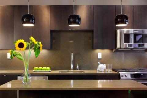 Modern Kitchen with electrical socket in backsplash