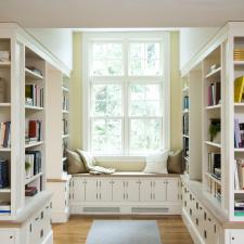 Contemporary Library with built in bench next to the window