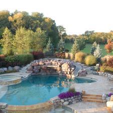 Contemporary Pool with neutral lounge chairs