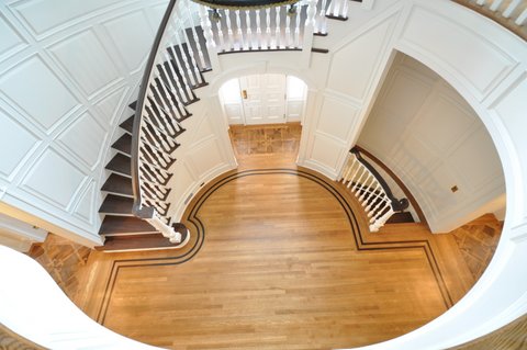 Transitional Entry with medium stained hardwood flooring