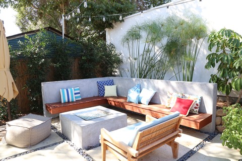 Contemporary Patio with cement and wood bench seating