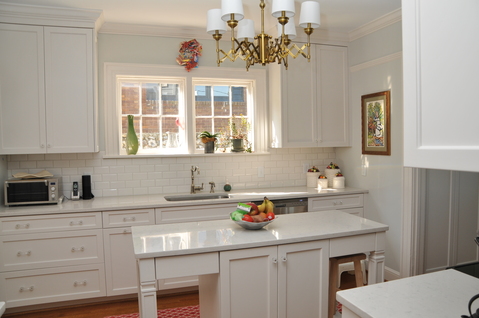 Modern Kitchen with white recessed panel cabinets