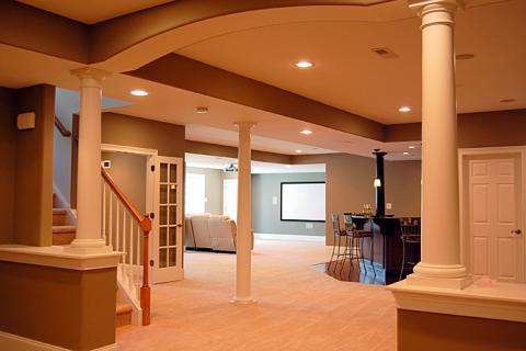 Traditional Entry with white and wood banister