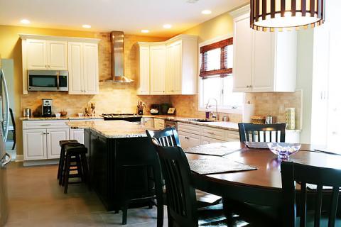 Eclectic Kitchen with black wood breakfast bar stools with black leather cushion