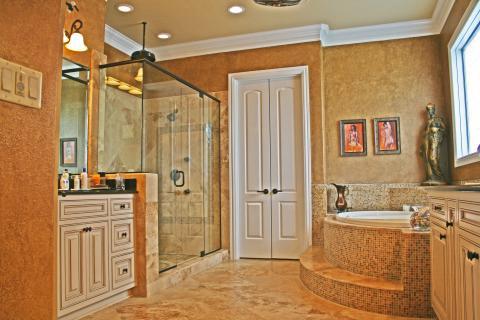 Traditional Bathroom with small tan and brown tile accent