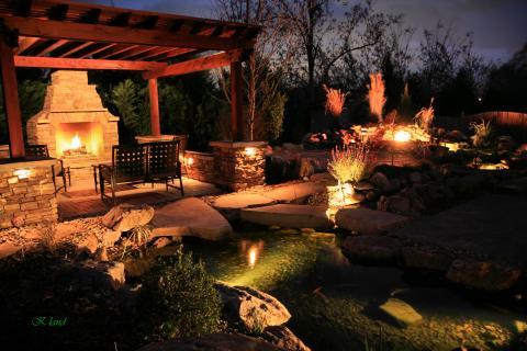 Traditional Landscape with black metal patio furniture