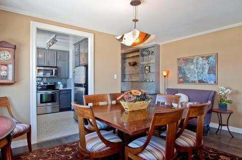 Transitional Dining Room with stainless steel appliances