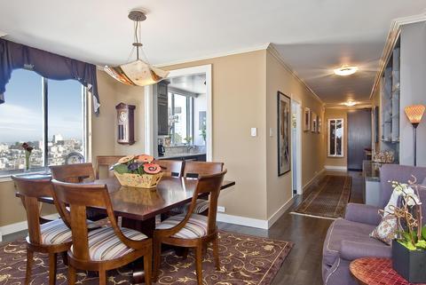 Transitional Dining Room with traditional area rug