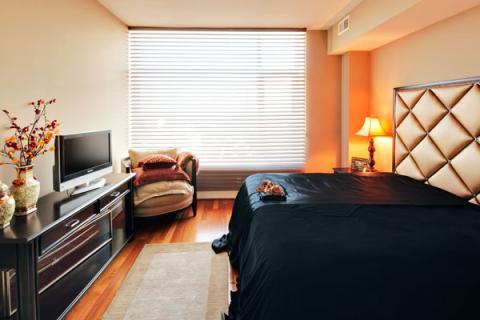 Contemporary Bedroom with bed side table lamp with white shade