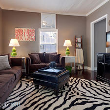 Eclectic Family Room with brown upholstered furniture