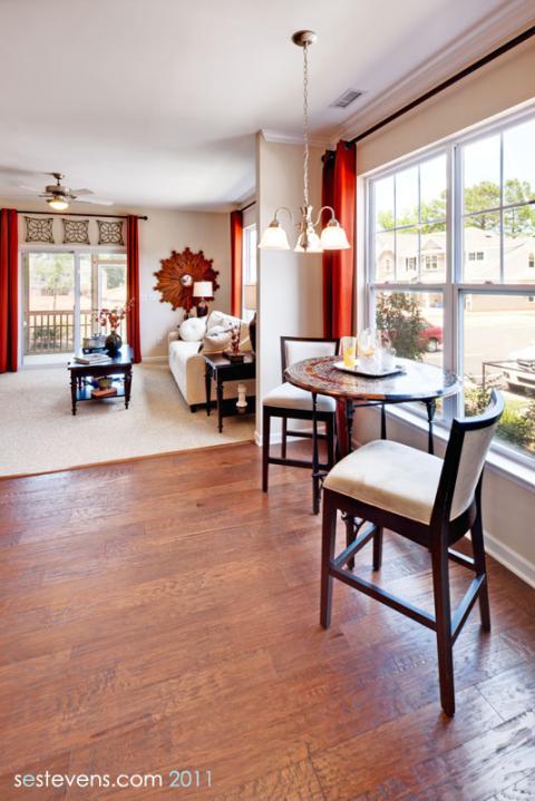 Eclectic Dining Room with dark wood coffee table