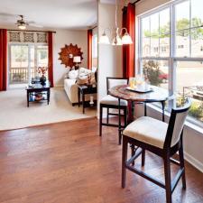 Eclectic Dining Room with white upholstered sofa