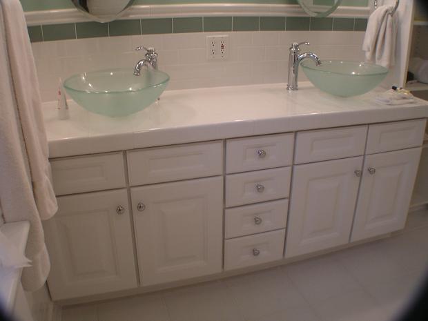 Traditional Master Bathroom with whtie raised panel cabinets