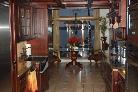 Traditional Dining Room with large black metal hanging chandelier