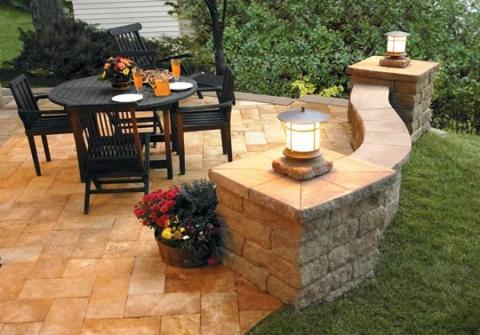 Traditional Patio with wood outdoor dining table