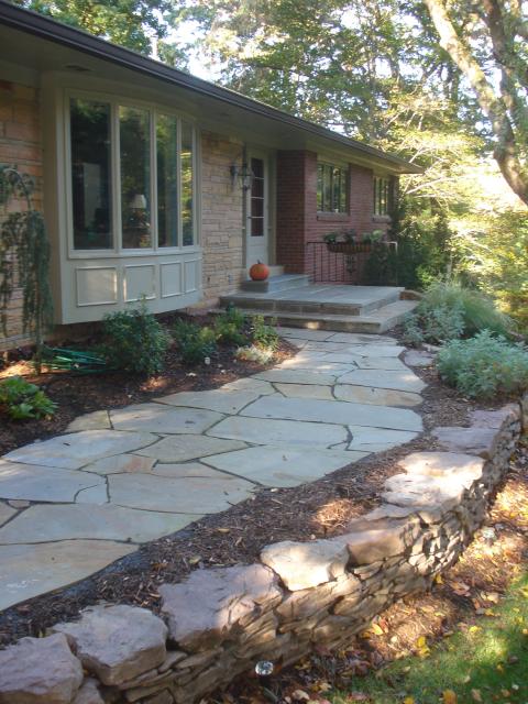 Traditional Walkway with ranch style home in the trees
