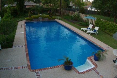 Tropical Pool with semi-private cedar fence