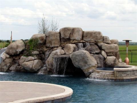 Traditional Pool with man made cave in pool