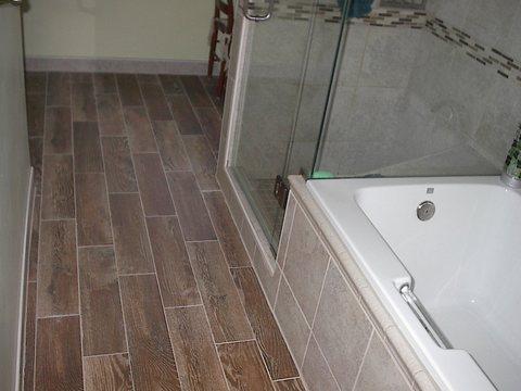 Contemporary Bathroom with wood porcelain floors