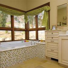 Eclectic Bathroom with small light blue and brown accent tile