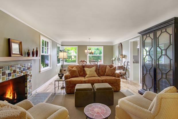 Contemporary Family Room with colorful tile fire place facing