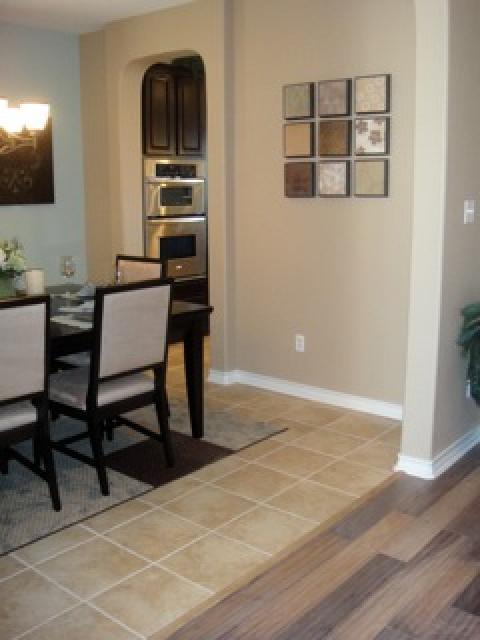 Contemporary Dining Room with stainless steel appliances