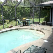 Traditional Sunroom with large sun room with in ground pool