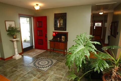Eclectic Entry with ceiling mounted light fixture