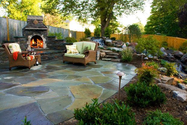 Transitional Patio with tall wooden privacy fencing