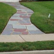 Eclectic Landscape with narrow slate walkway