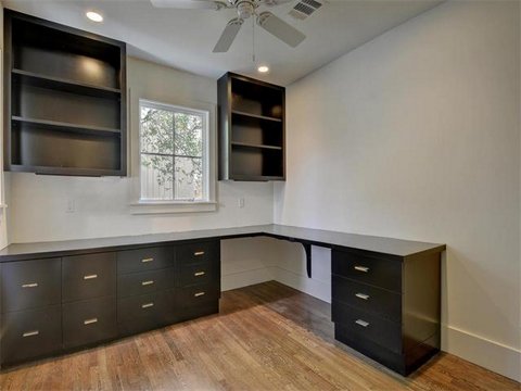 Contemporary Home Office with ceiling fan and light