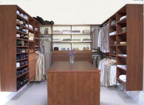 Traditional Closet with custom closet organization