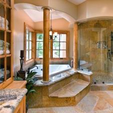 French Bathroom with glass front cabinet doors