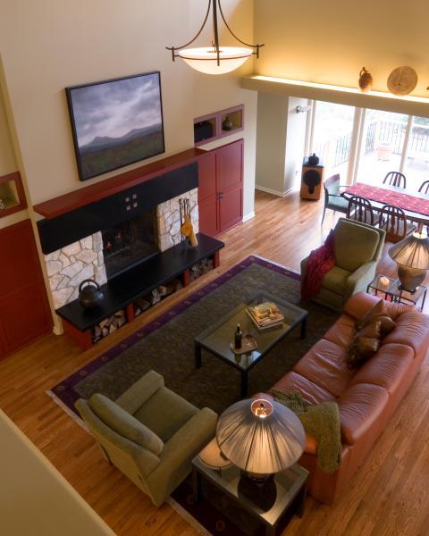 Eclectic Family Room with dark wood dining table and chairs