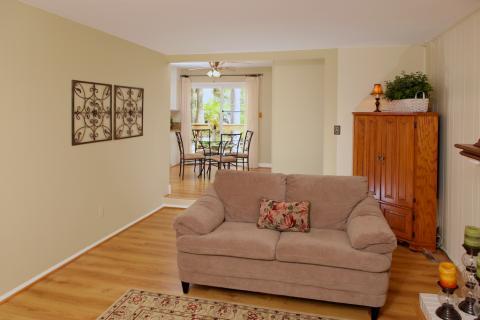 Contemporary Family Room with light wood media entertainment center