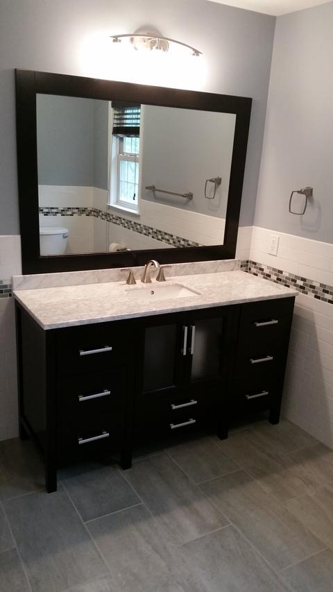 Contemporary Bathroom with frosted glass front cabinet doors