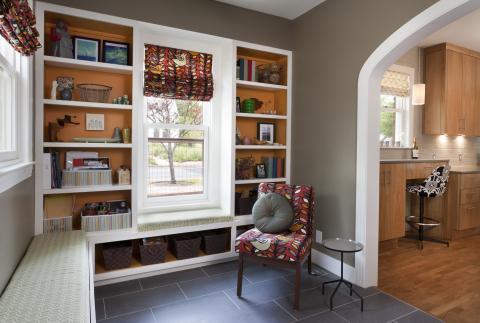 Contemporary Entry with orange painted interior of storage