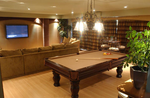 Traditional Home Theater with wall mounted flat screen tv